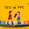 SEO vs PPC digital marketing comparison illustrated as a boxing match, representing organic search optimization versus paid advertising. Essence Tech Labs branding.